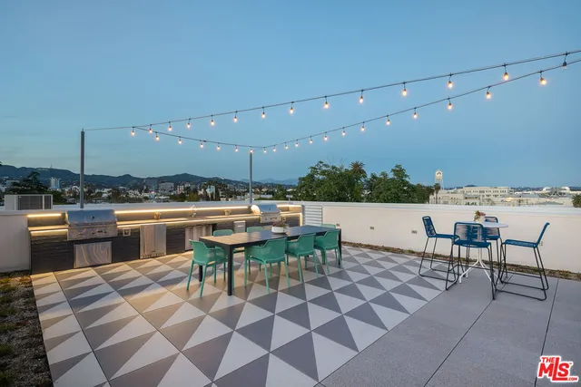 a view of a terrace with city view