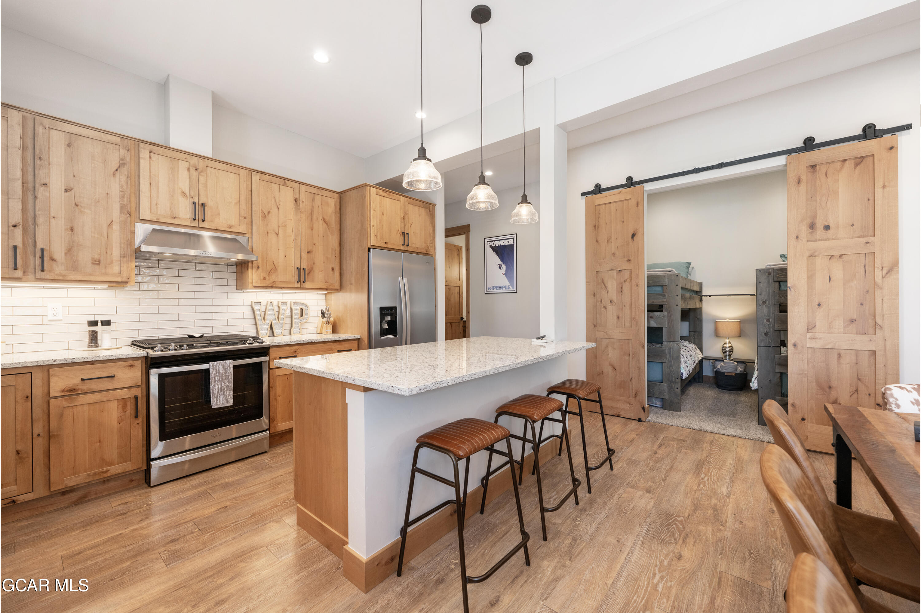 16 Springview Lane Fraser, CO 80442 - Photo 13 of 36 Breakfast bar and kitchen