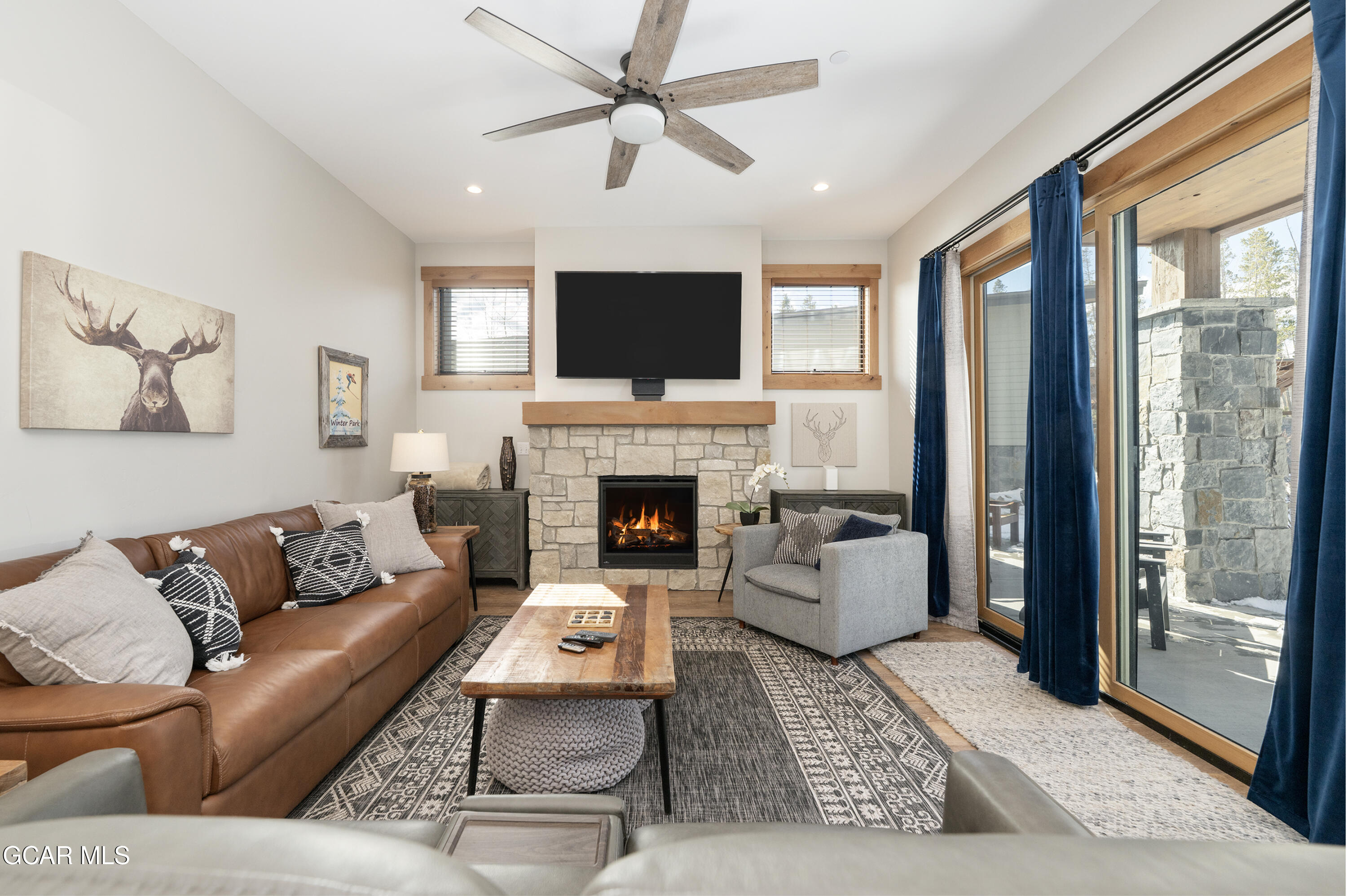 16 Springview Lane Fraser, CO 80442 - Photo 16 of 36 living room with cozy fireplace