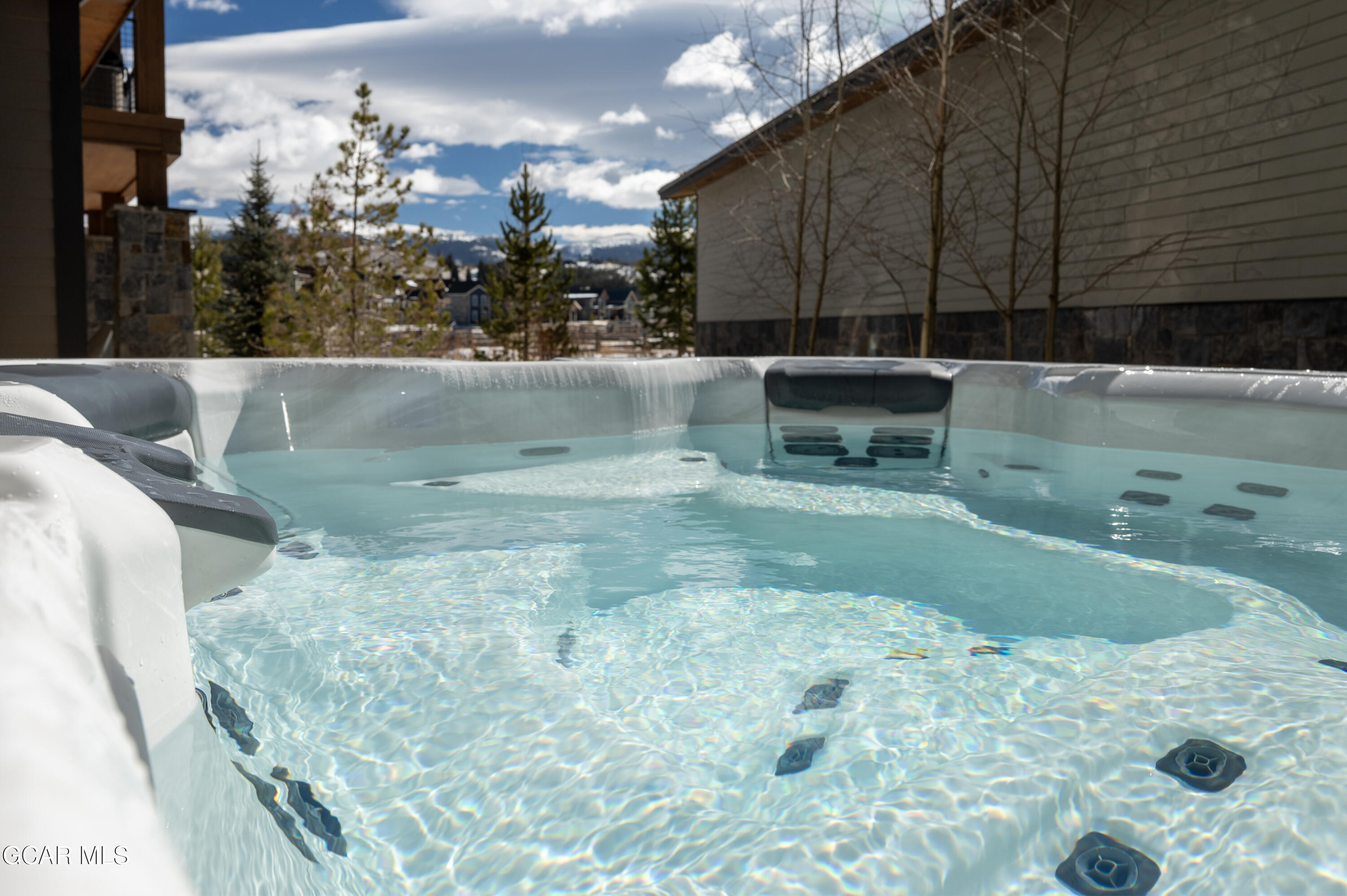 16 Springview Lane Fraser, CO 80442 - Photo 20 of 36 Hot tub with views of the mountains