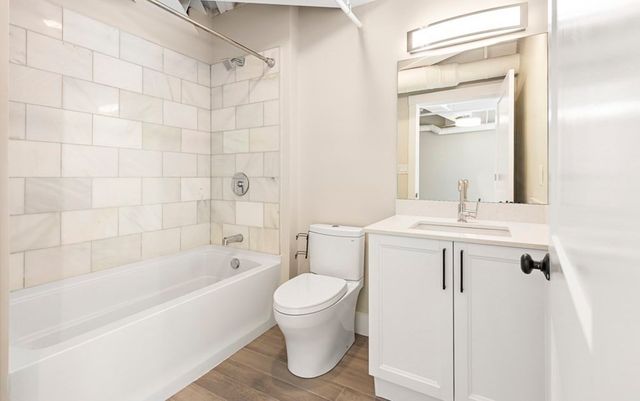 a workspace with furniture and wooden floor