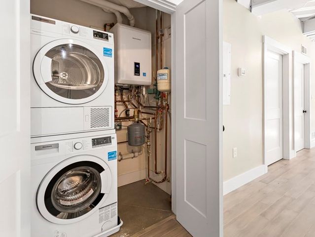 a kitchen with a table and chairs