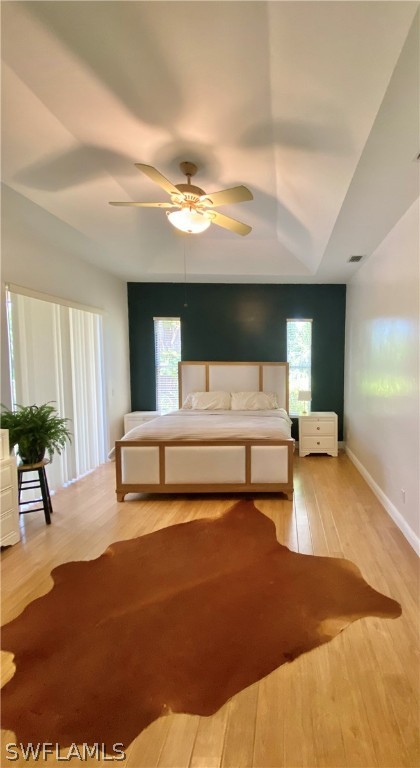 9012 West Ridge Court Fort Myers, FL 33912 - Photo 17 of 23 a bedroom with furniture and a large window
