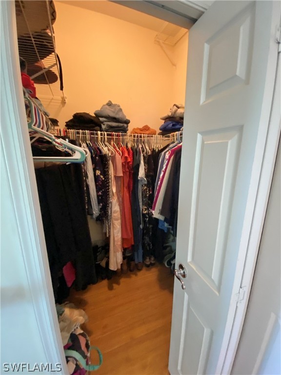 9012 West Ridge Court Fort Myers, FL 33912 - Photo 22 of 23 a view of walk in closet with clothes and shoes
