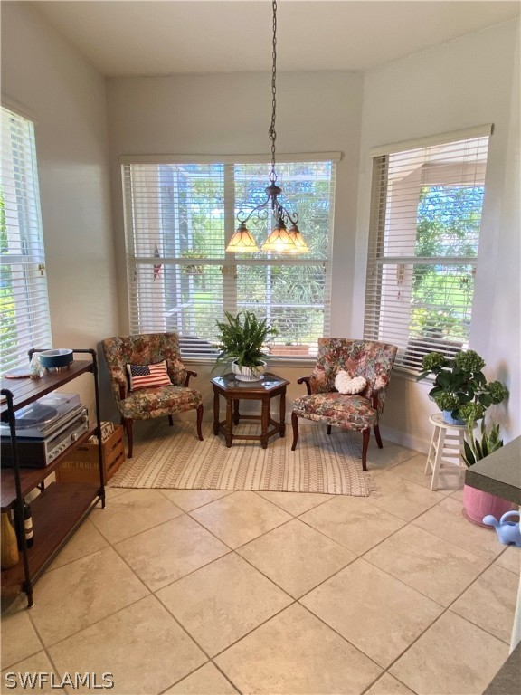 9012 West Ridge Court Fort Myers, FL 33912 - Photo 10 of 23 a living room with furniture and a large window