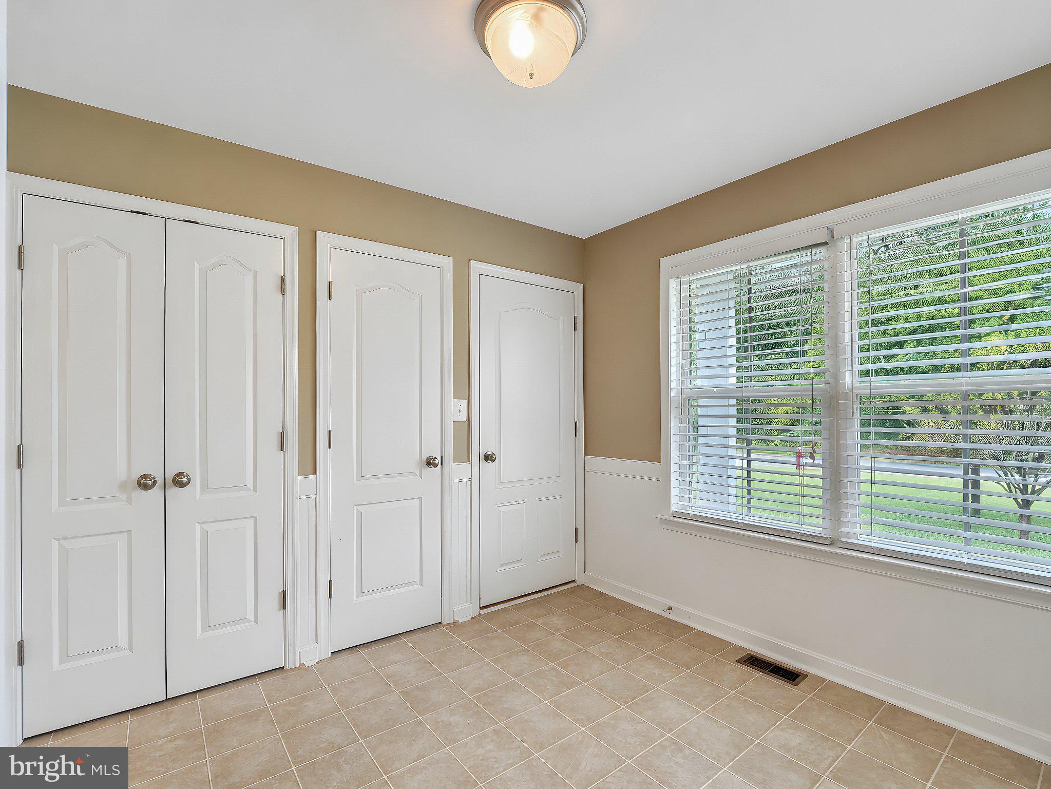 18532 Cherryfield Road Drayden, MD 20630 - Photo 46 of 58 Laundry room view of closet & garage access