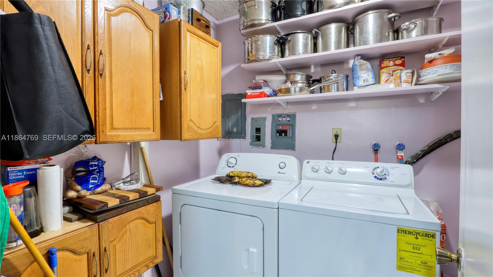 15825 Southwest 305th Terrace Homestead, FL 33033 - Photo 14 of 36 a utility room with dryer and washer