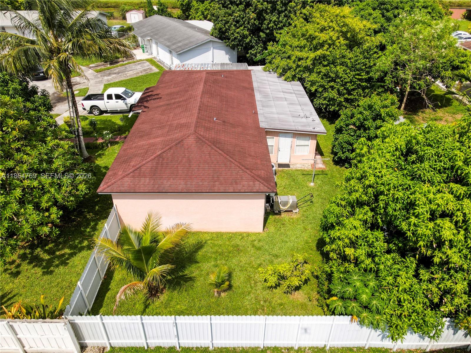 15825 Southwest 305th Terrace Homestead, FL 33033 - Photo 3 of 36 a view of an outdoor space and yard