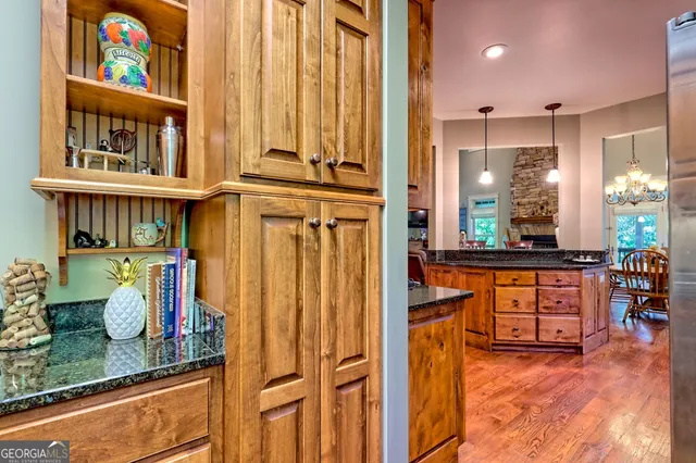 a balcony with furniture and a potted plant