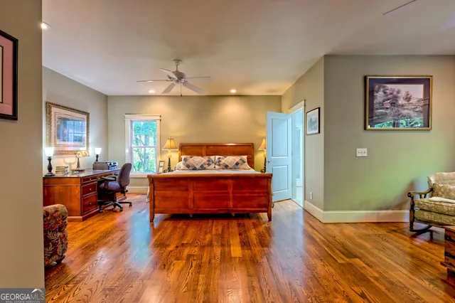 a living room with furniture fireplace and flat screen tv