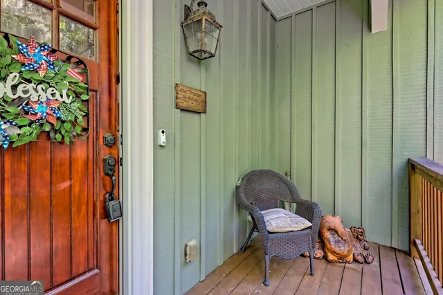a view of a dining room with furniture wooden floor and chandelier