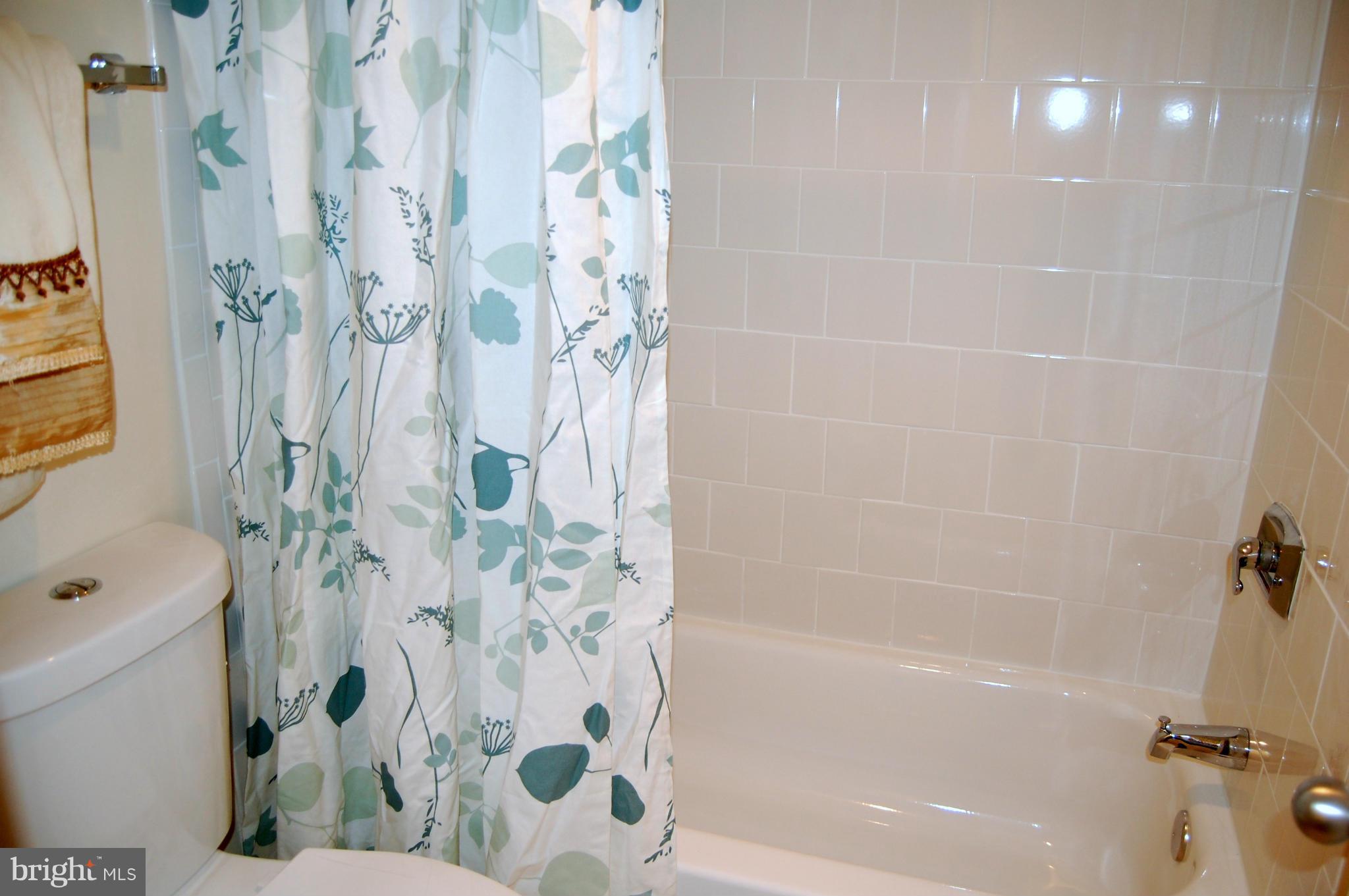 5505 Seminary Road, Unit 1407N Falls Church, VA 22041 - Photo 12 of 30 a bathroom with a bathtub and shower