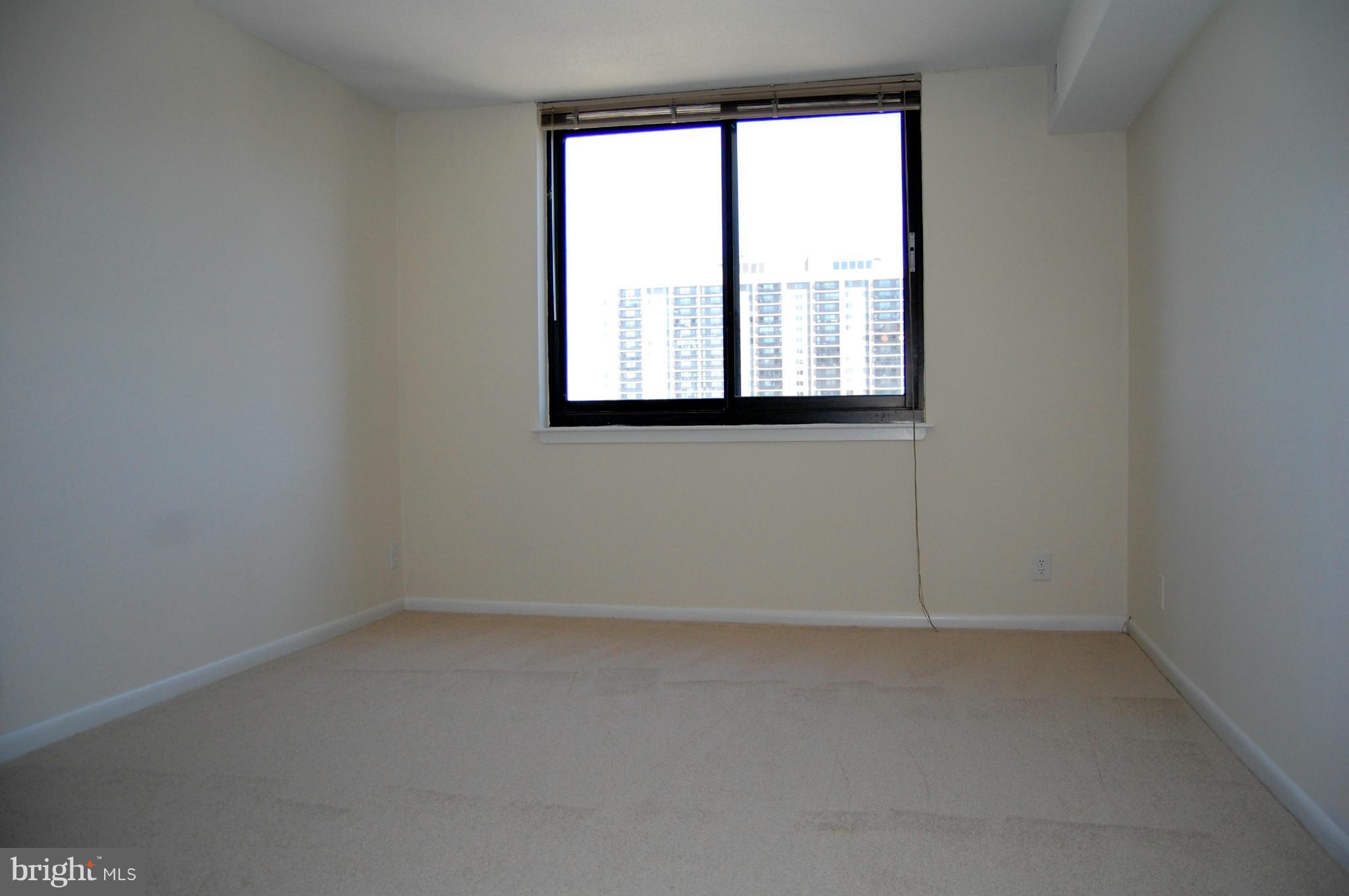 5505 Seminary Road, Unit 1407N Falls Church, VA 22041 - Photo 10 of 30 an empty room with a window