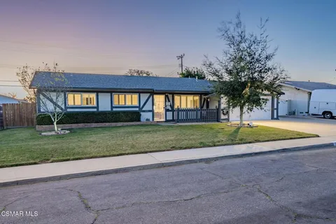 a house view with a garden space