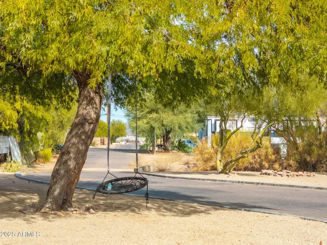 a large kitchen with stainless steel appliances granite countertop a lot of counter space and a sink