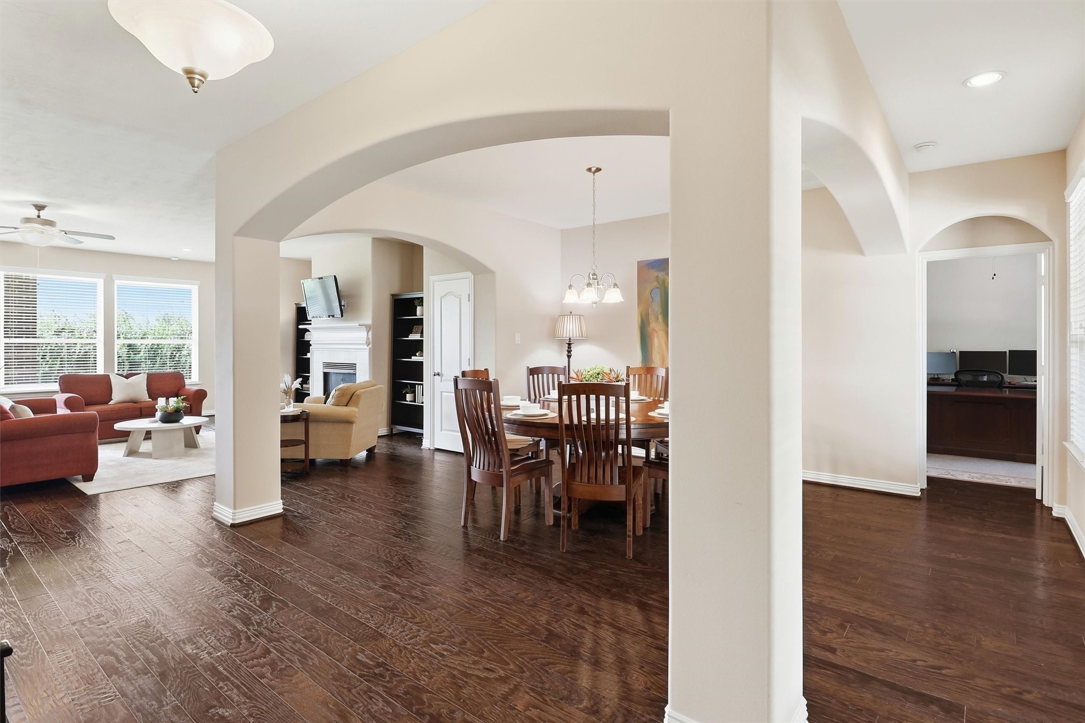3219 Cotton Ranch Drive Katy, TX 77494 - Photo 3 of 45 From the moment you step inside, the foyer offers a glimpse of the home's inviting layout, with open views of the family room, formal dining room, & home office, creating a welcoming flow for everyday living & entertaining.