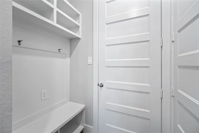 a view of an empty walk in closet