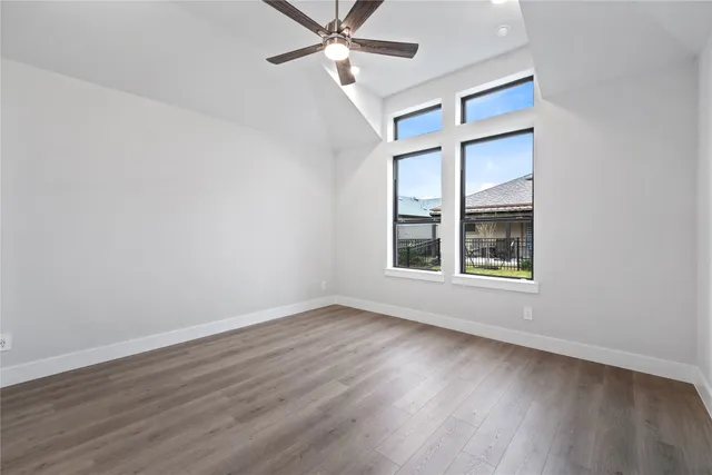 a bathroom with a double vanity sink and mirror