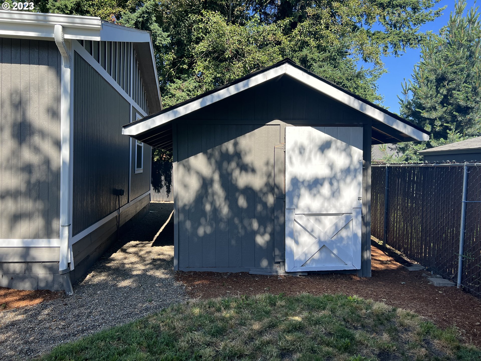 170 Fenton Avenue Molalla, OR 97038 - Photo 16 of 27 a house with trees in the background