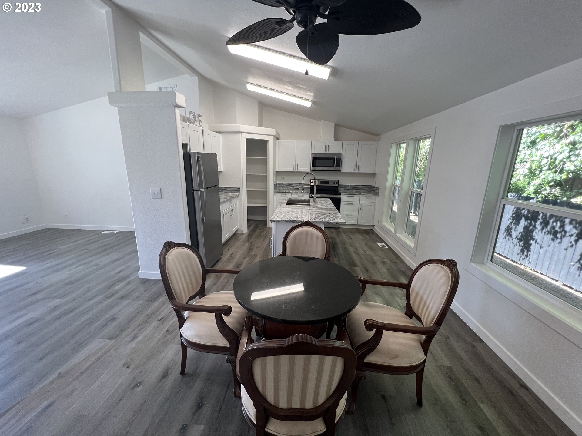 170 Fenton Avenue Molalla, OR 97038 - Photo 18 of 27 a view of a dining room with furniture and a large window