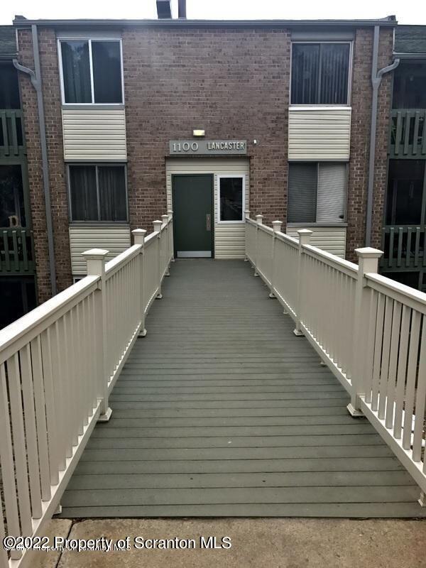 1111 Summit Pointe Scranton, PA 18508 - Photo 1 of 22 a view of a house with a balcony
