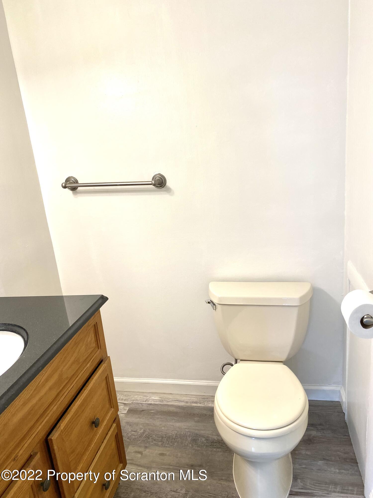 1111 Summit Pointe Scranton, PA 18508 - Photo 14 of 22 a bathroom with a toilet and a sink