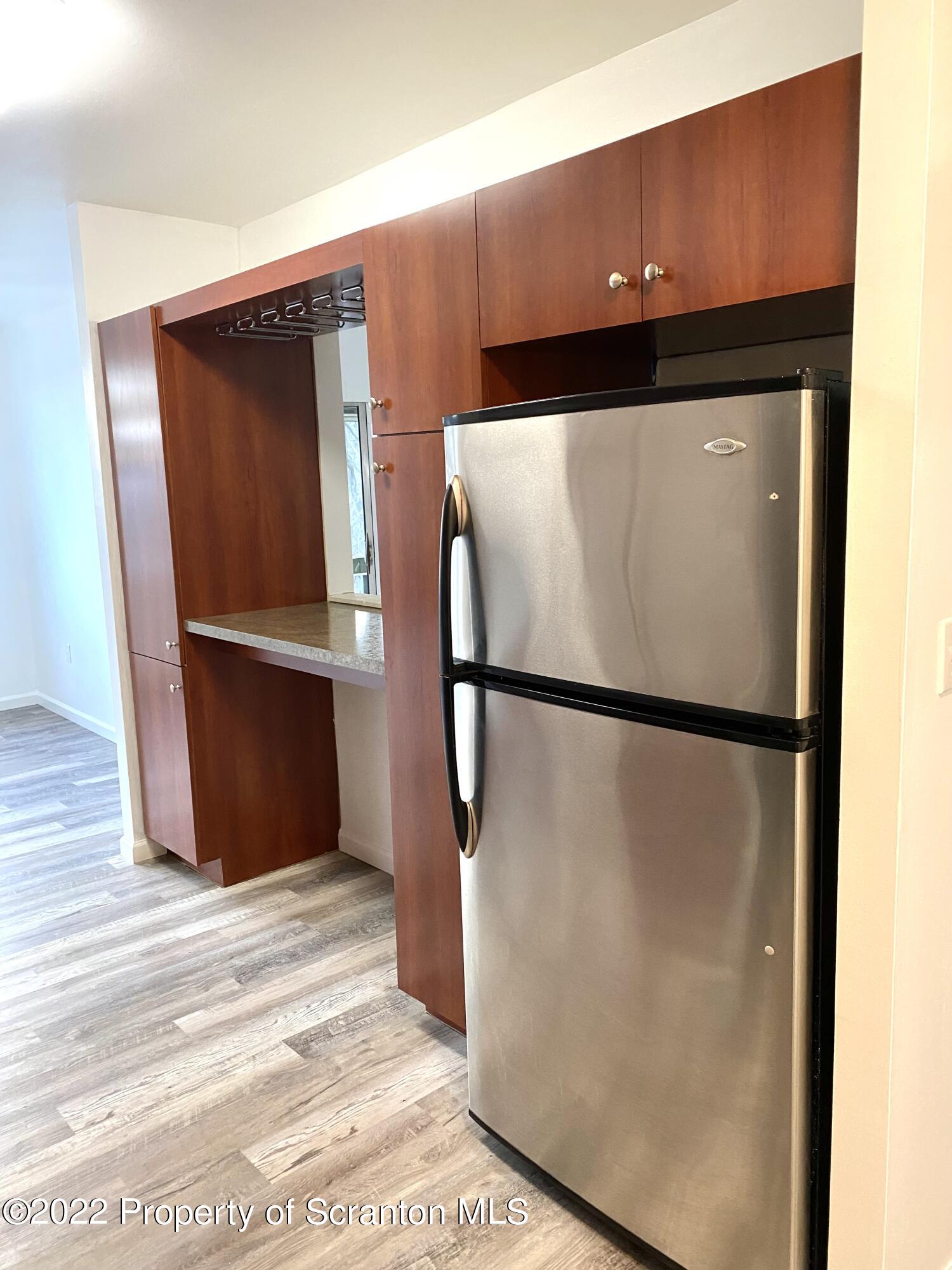 1111 Summit Pointe Scranton, PA 18508 - Photo 6 of 22 a refrigerator freezer sitting inside of a kitchen
