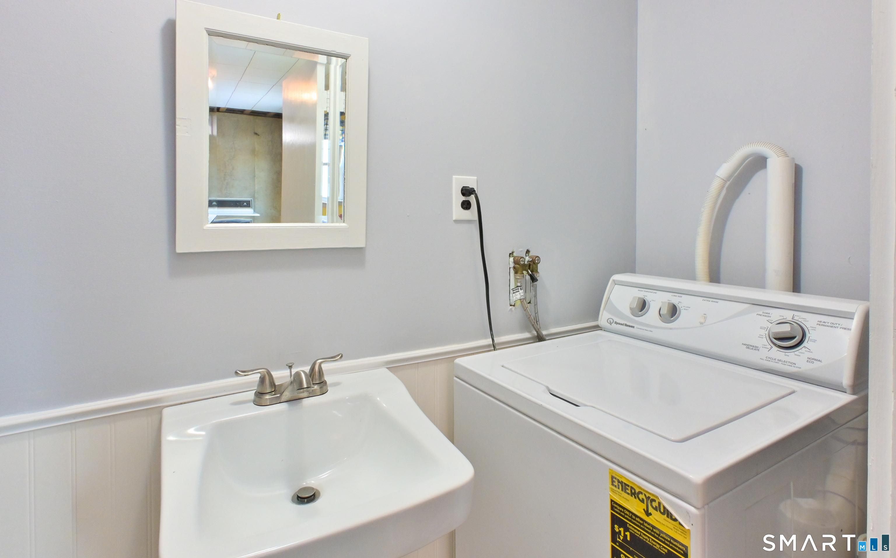 76 South Kent Road Kent, CT 06757 - Photo 17 of 20 a bathroom with a sink and a mirror