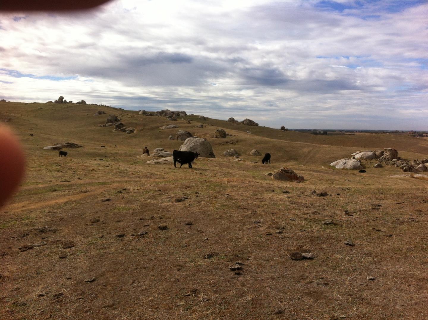 a view of an ocean beach and mountain