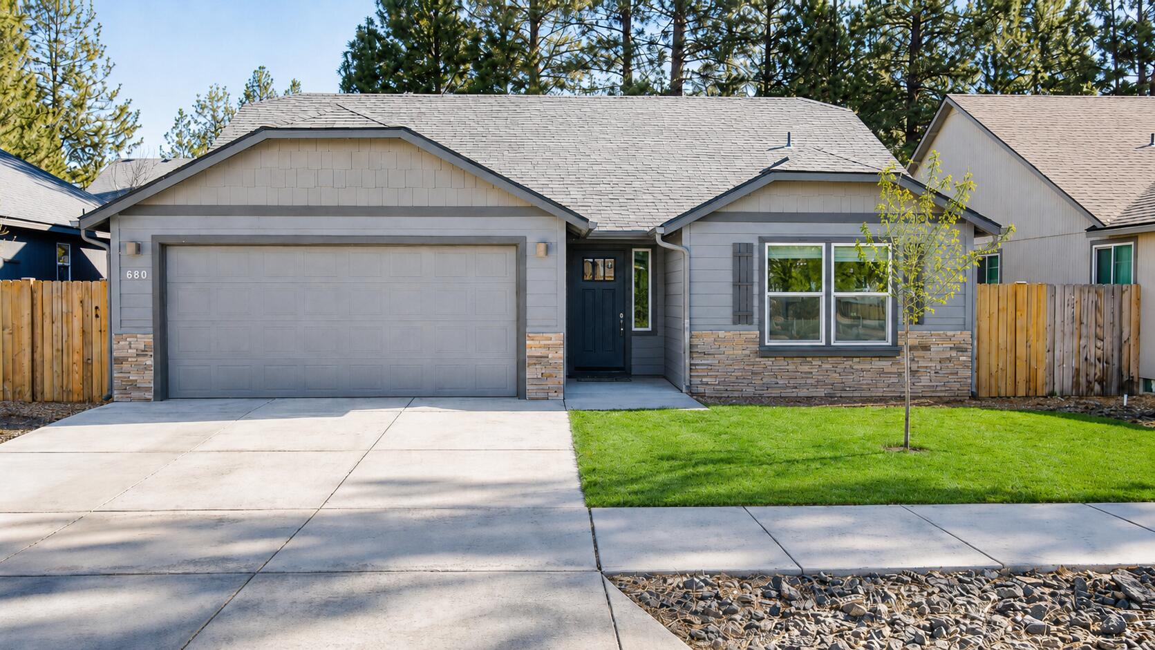 680 McKinney Ranch Road Sisters, OR 97759 - Photo 6 of 41 a view of a house with a yard