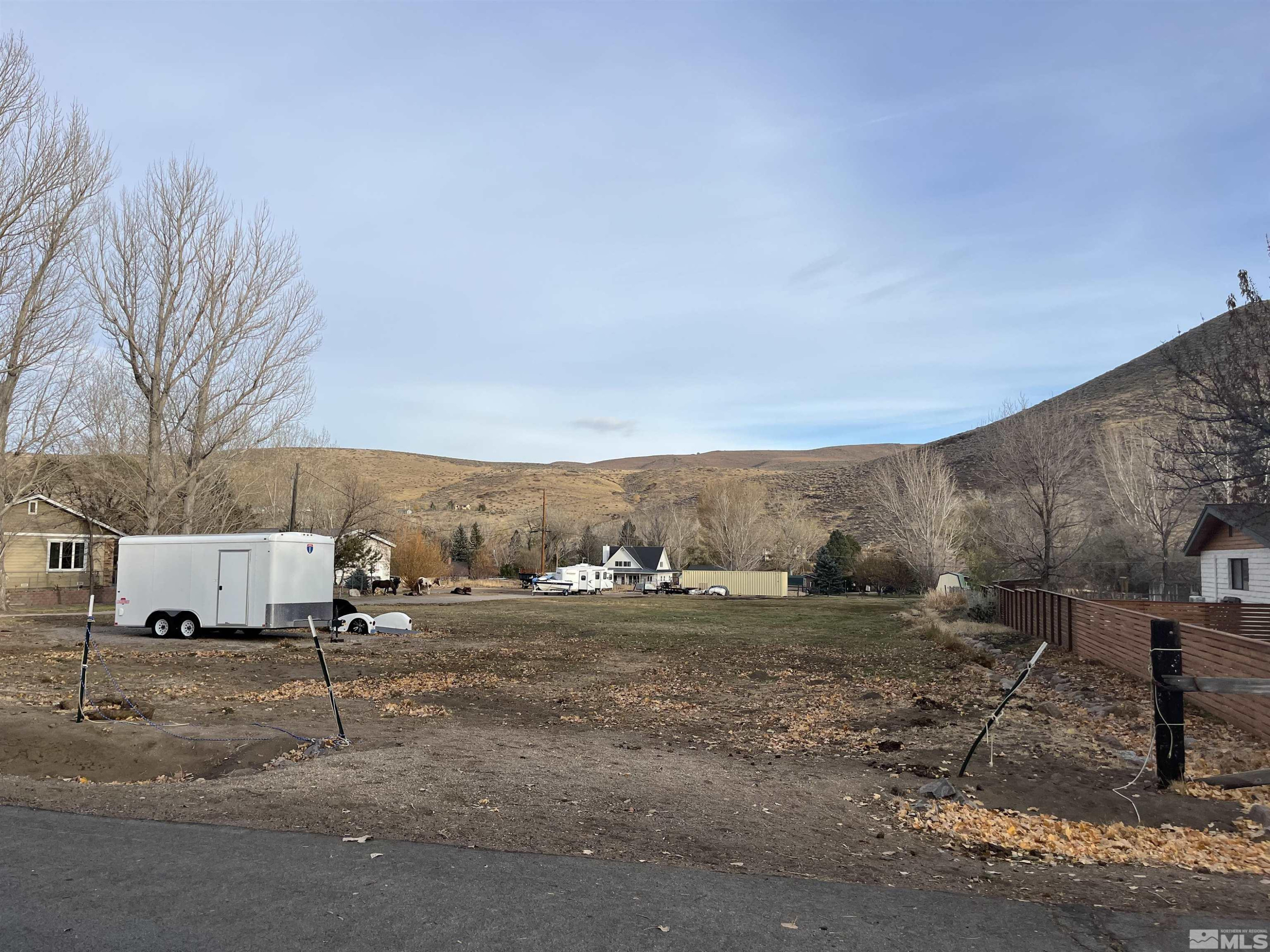 22860 Carriage Drive Reno, NV 89521 - Photo 2 of 2 a view of a dry yard with trees