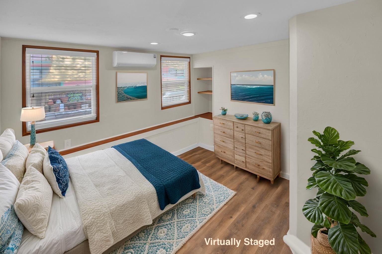 235 Antigua Road Tavernier, FL 33070 - Photo 15 of 48 a bedroom with a bed window and a potted plant