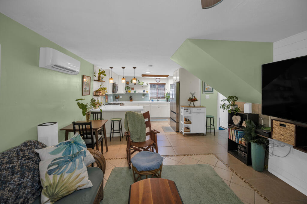 235 Antigua Road Tavernier, FL 33070 - Photo 30 of 48 a living room with furniture and a flat screen tv
