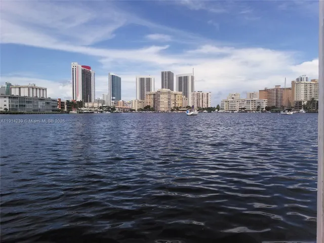 a view of a swimming pool with a yard