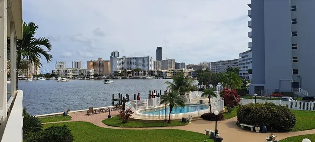 a view of balcony with a swimming pool