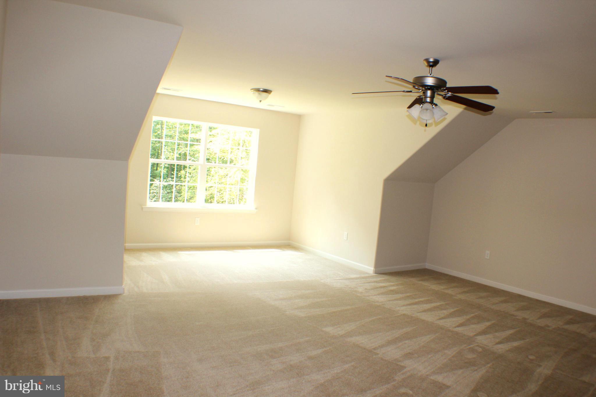 652 West Rocky Run Road Fredericksburg, VA 22406 - Photo 12 of 20 an empty room with windows