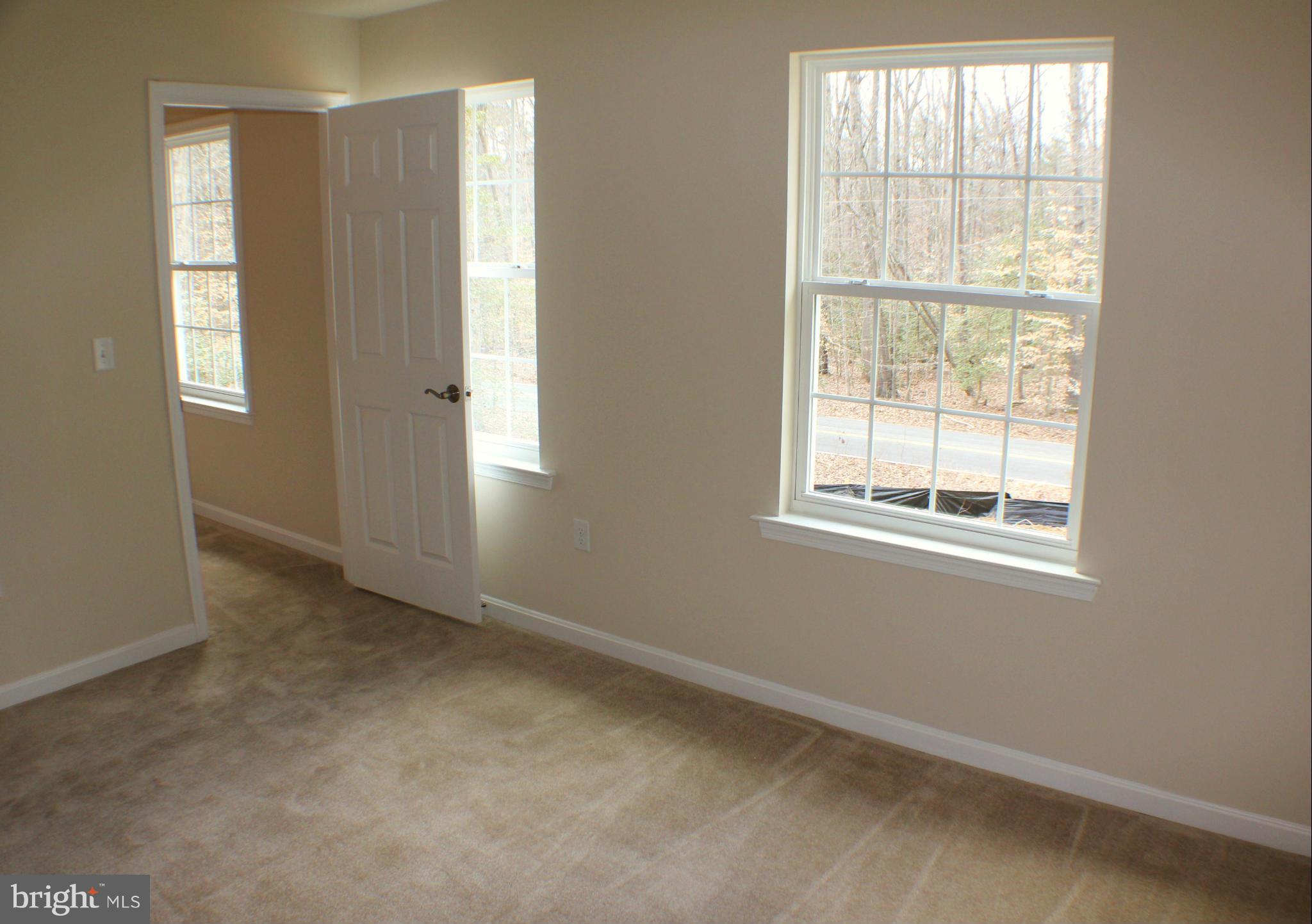 652 West Rocky Run Road Fredericksburg, VA 22406 - Photo 17 of 20 an empty room with windows