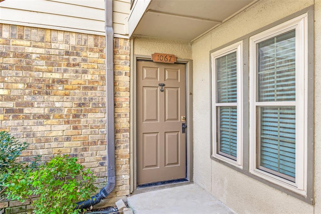 5300 Keller Springs Road, Unit 1067 Dallas, TX 75248 - Photo 2 of 14 a view of front door of house