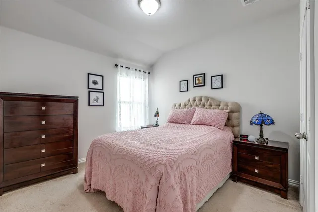 a bedroom with a bed and a closet