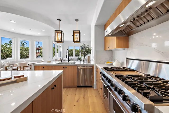 a kitchen with a stove and a sink