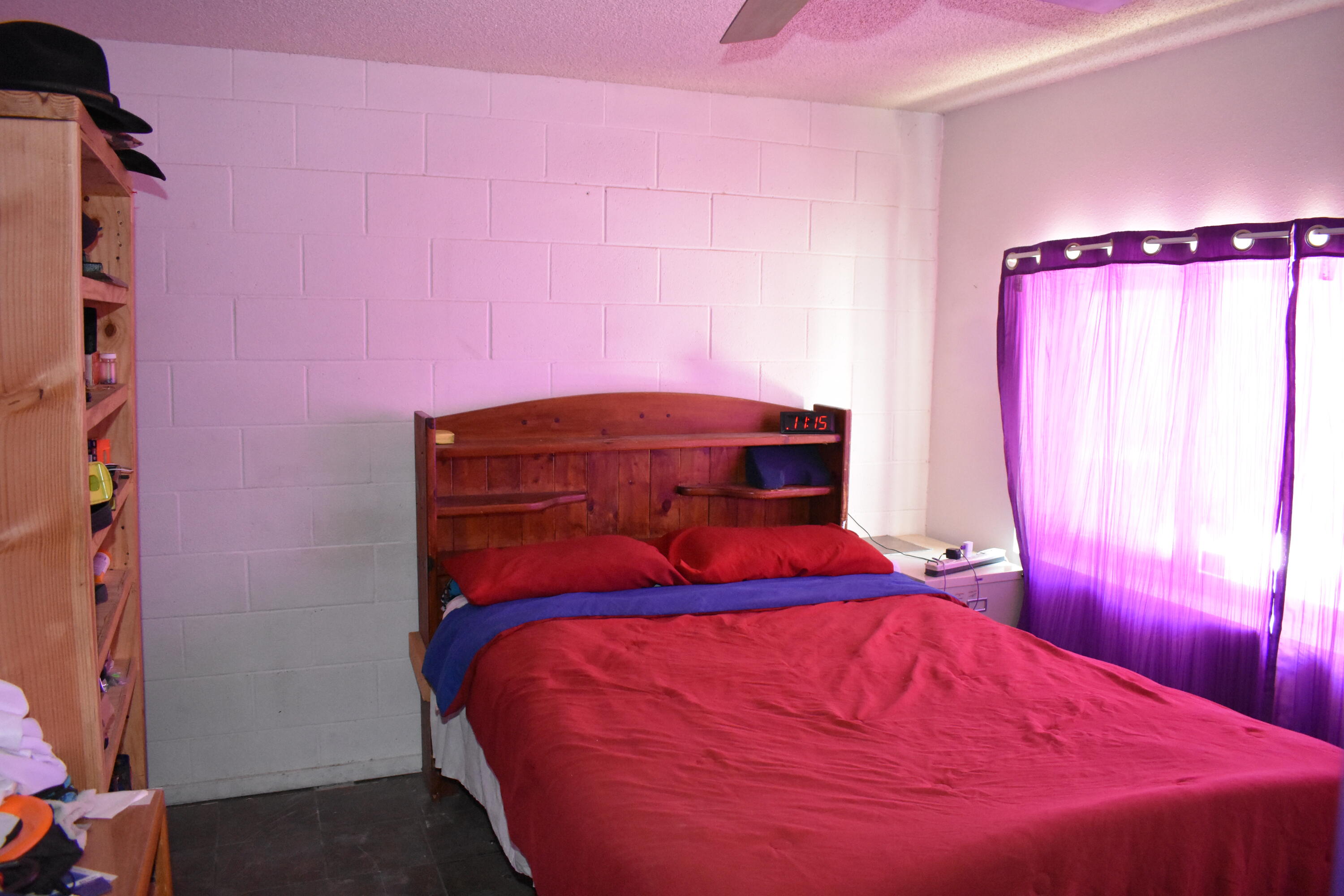 6293 Backus Road Mojave, CA 93501 - Photo 18 of 35 a bedroom with a bed and a window