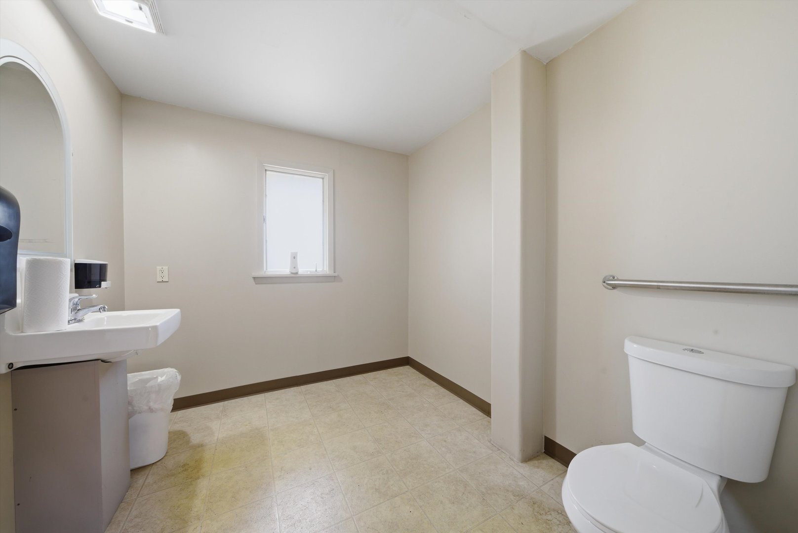 2304 Plainfield Road Crest Hill, IL 60403 - Photo 25 of 56 a bathroom with a toilet sink and mirror