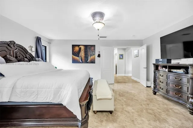 a bathroom with a bathtub and a sink