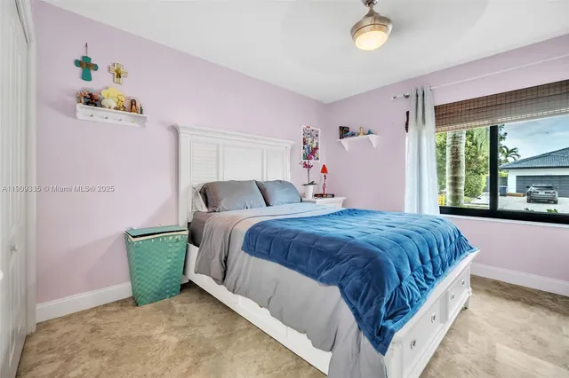 a bed room with a bed and a walk in closet