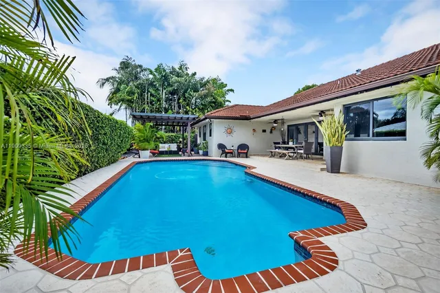 a view of yard with patio