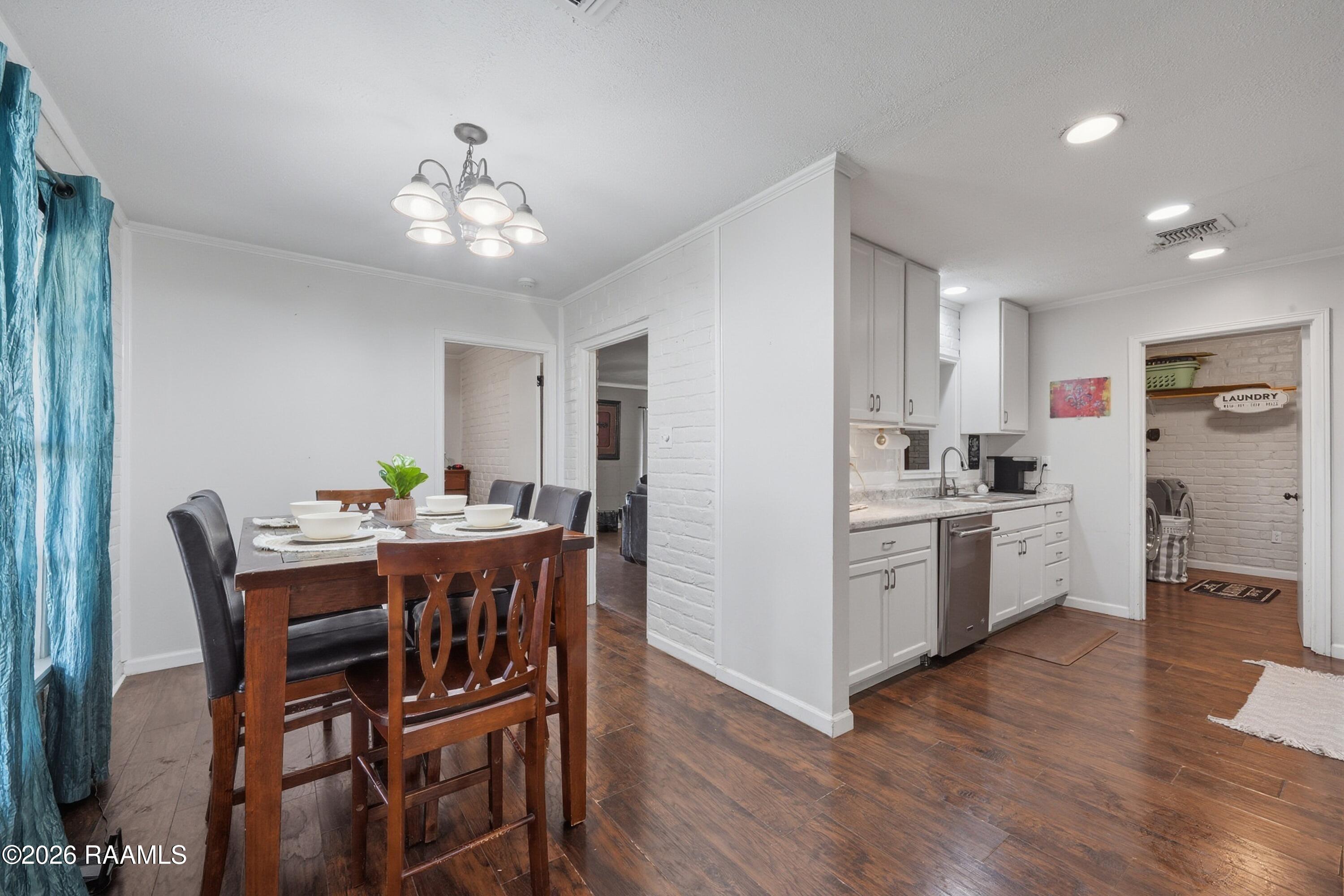 218 Fallis Road Lafayette, LA 70507 - Photo 8 of 23 Fallis breakfast room and kitchen