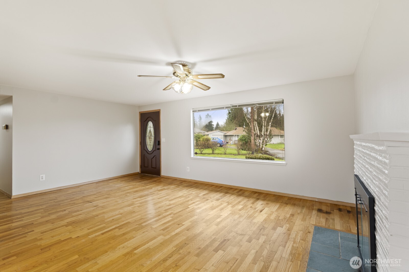 12742 Southeast 171st Place Renton, WA 98058 - Photo 15 of 33 wooden floor in an empty room with a window