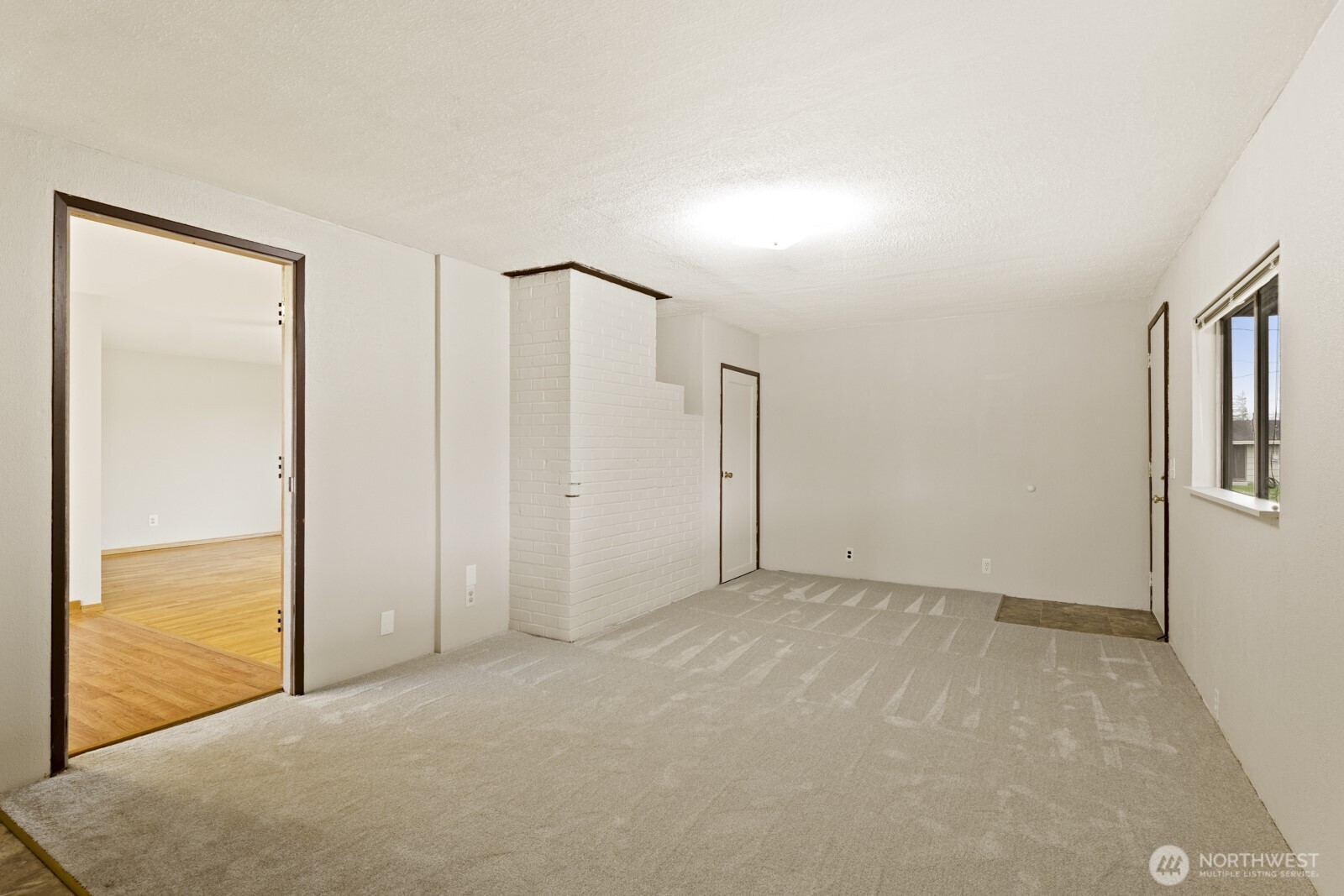 12742 Southeast 171st Place Renton, WA 98058 - Photo 18 of 33 a view of an empty room