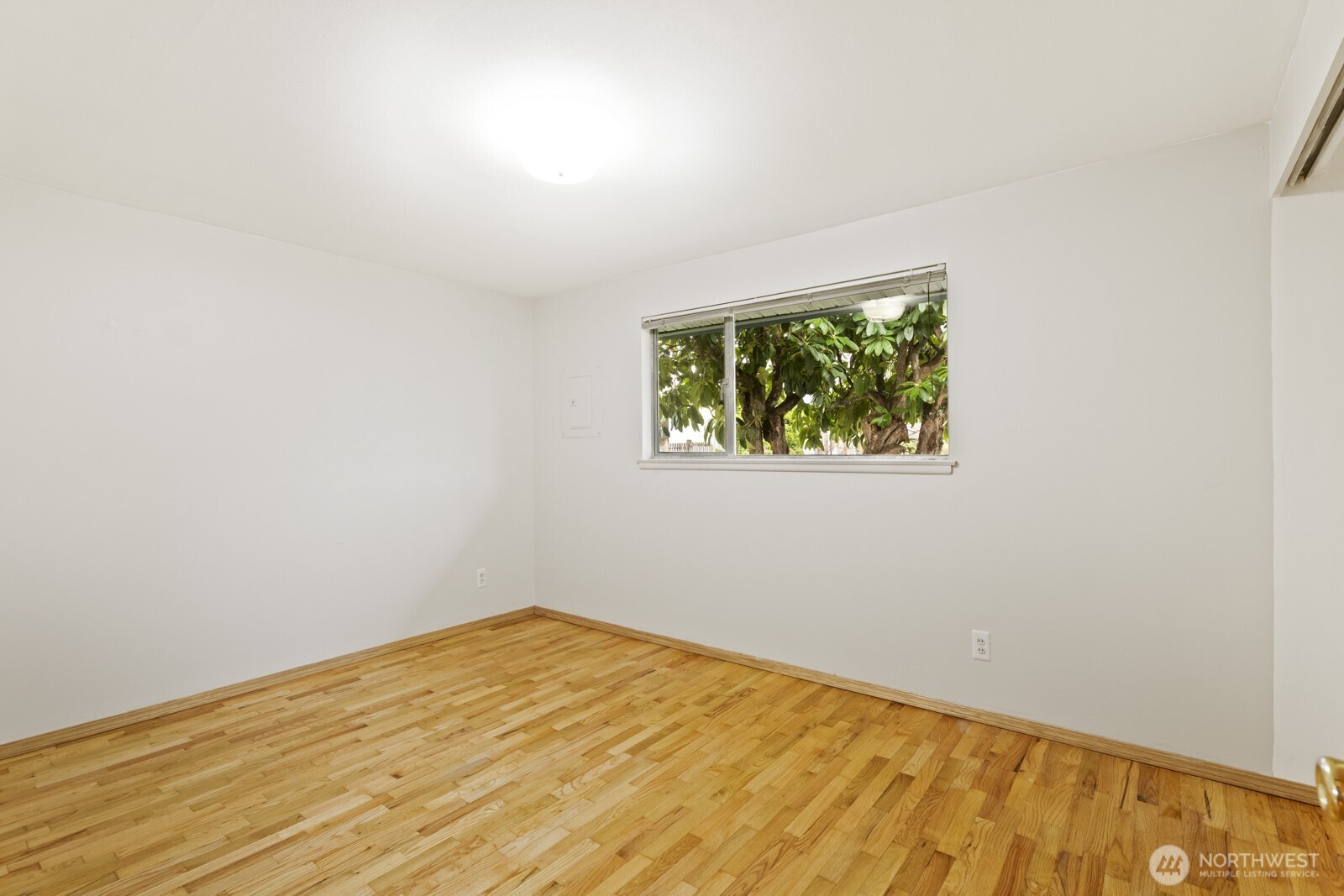 12742 Southeast 171st Place Renton, WA 98058 - Photo 21 of 33 an empty room with a window