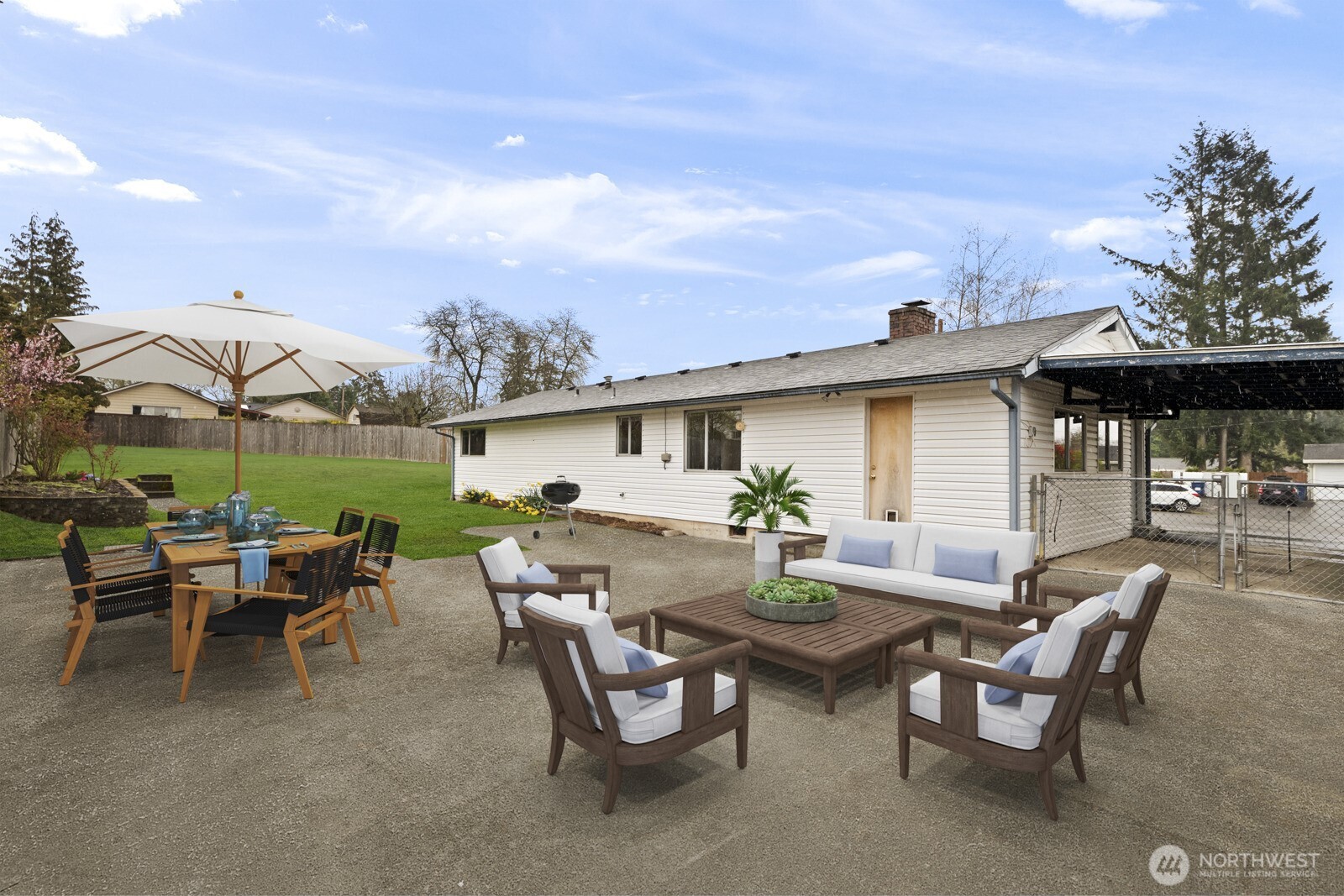 12742 Southeast 171st Place Renton, WA 98058 - Photo 10 of 33 a view of a patio with table and chairs and potted plants